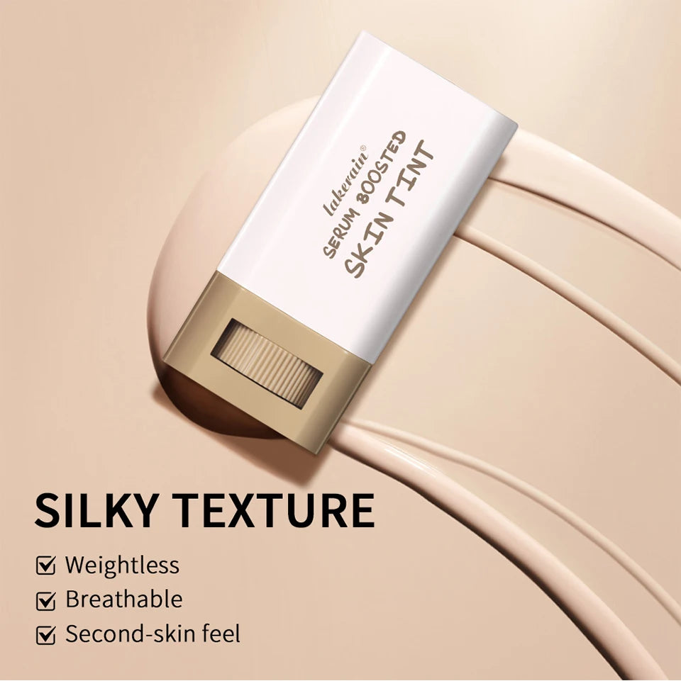 Serum boosted skin tint with creamy texture on beige background
