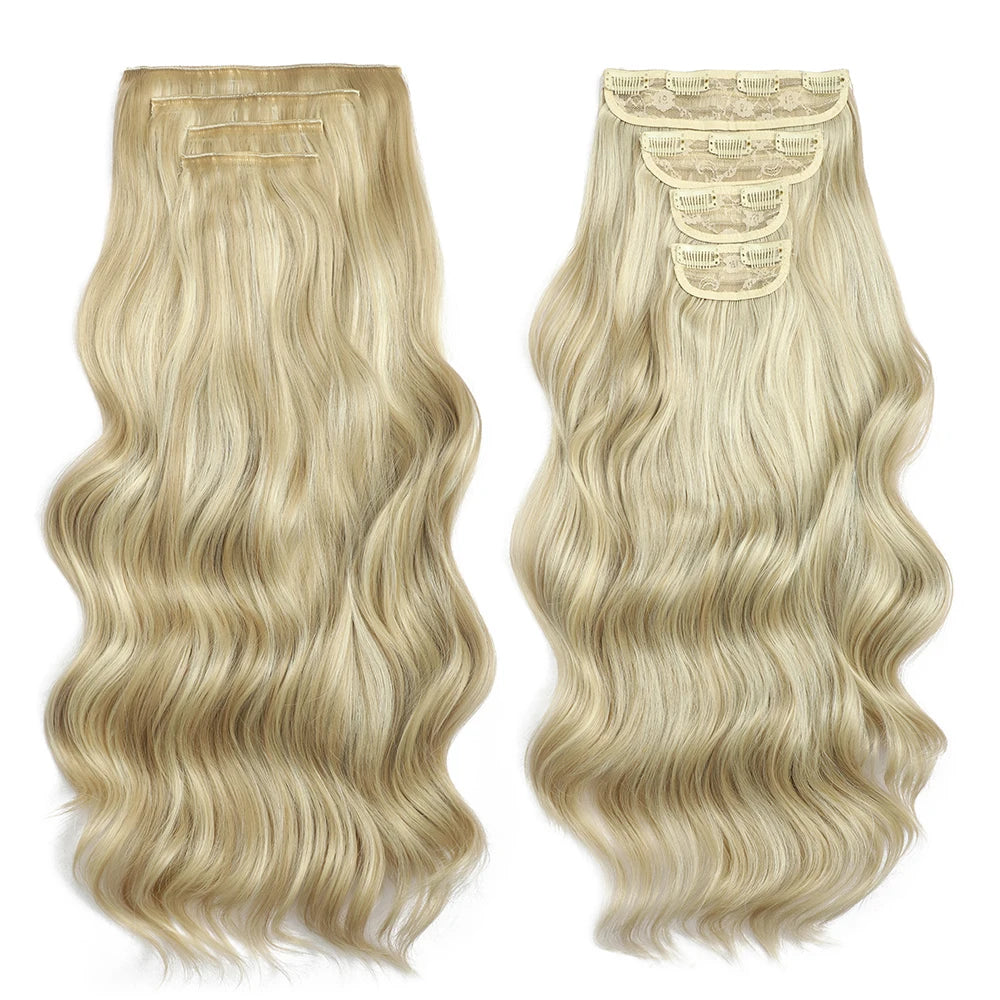 Two blonde hair extensions with wavy texture on a white background