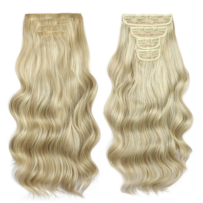 Two blonde hair extensions with wavy texture on a white background