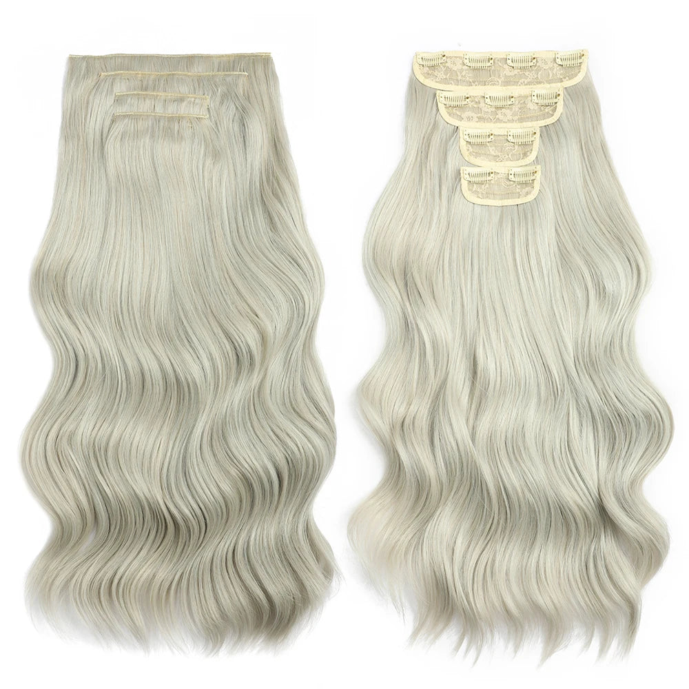 Two blonde hair extensions with wavy texture on a white background