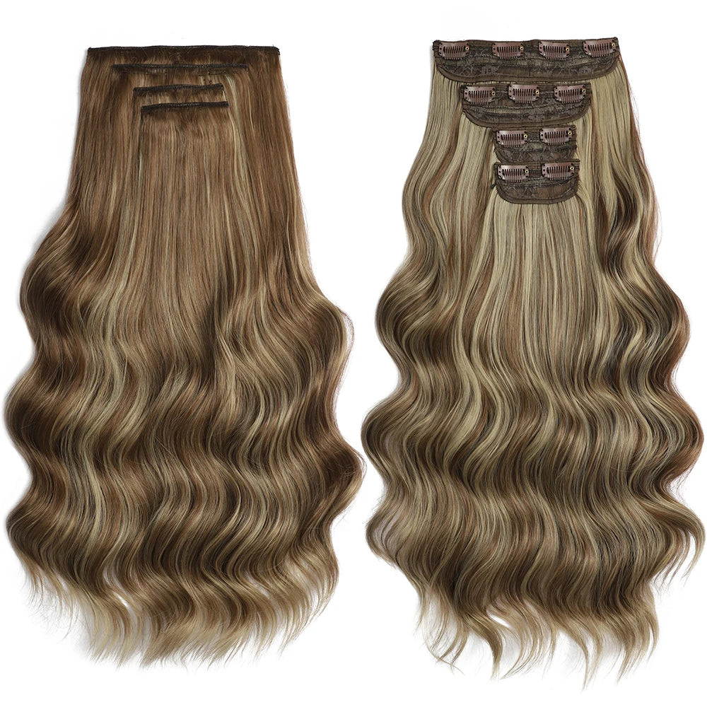 Two sets of wavy hair extensions with clips on a white background