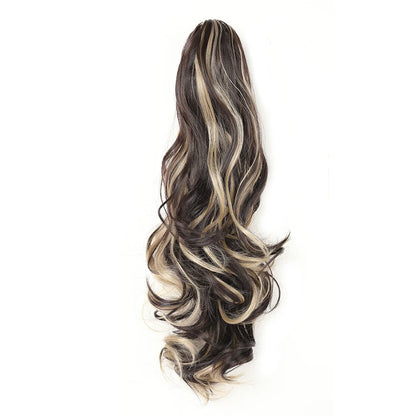 Wavy hair extension with black, brown, and blonde color