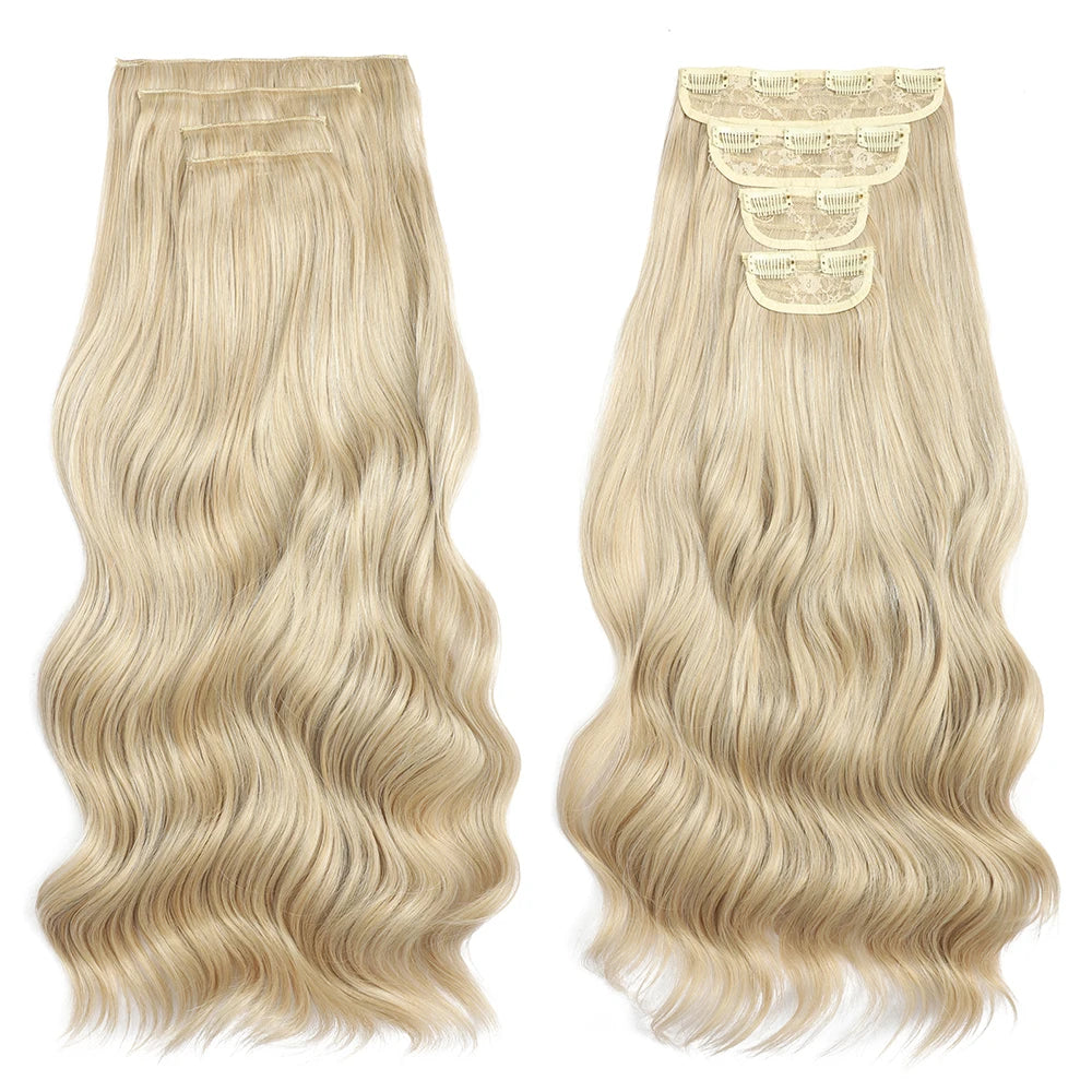 Two blonde hair extensions with wavy texture on a white background