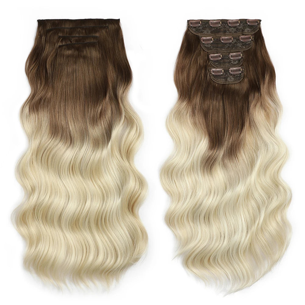 Set of hair extensions with brown to blonde gradient on a white background