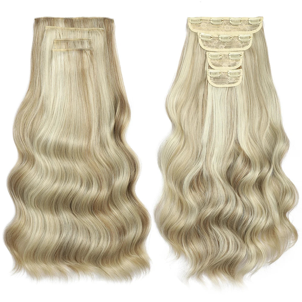 Two blonde wavy hair extensions on a white background