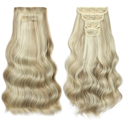 Two blonde wavy hair extensions on a white background