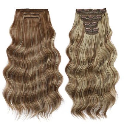 Two sets of wavy hair extensions on a white background