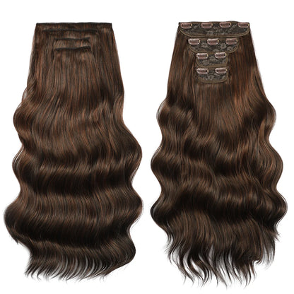 Two sets of brown hair extensions with clips on a white background