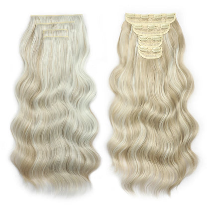 Two blonde hair extensions with wavy texture on a white background